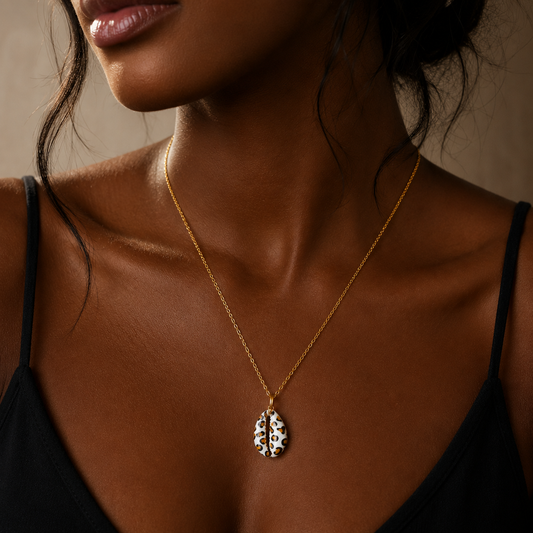 Collier cauri  – Collier coquillage chaine acier inoxydable doré